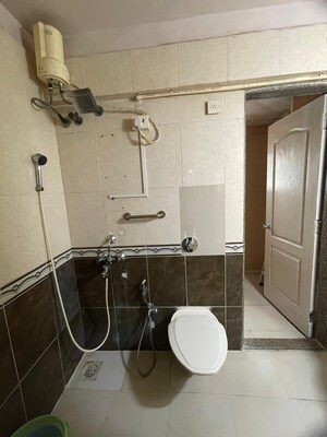 Master Bedroom in 2 BHK Apartment at Oshiwara Mhada, Andheri West – for Sale