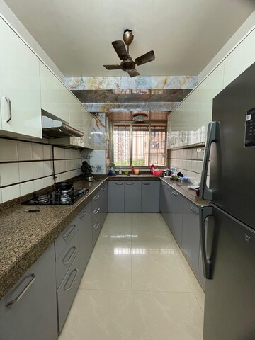 Kitchen in 2 BHK Apartment at Oshiwara Mhada, Andheri West – for Sale