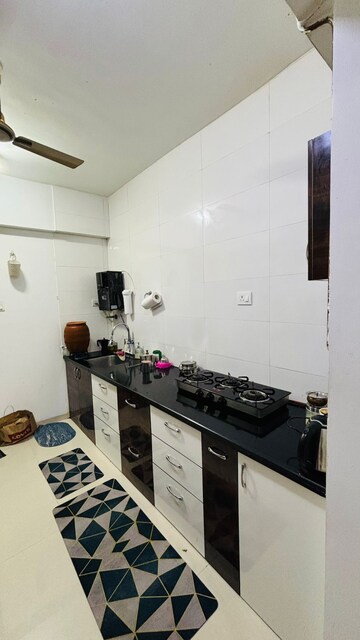 Kitchen in 2 BHK Apartment at Lakshmi Ivana, Wakad – for Rent