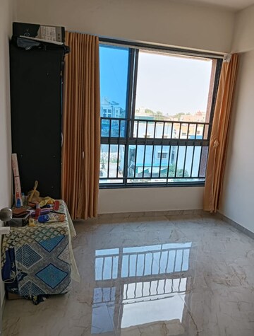 Room in 2 BHK Apartment at Kundan Easterlia, Lohgaon – for Rent