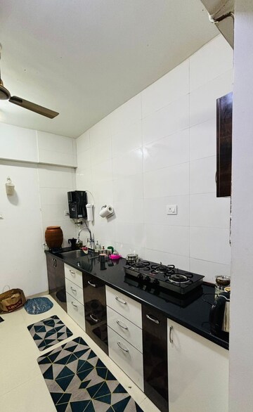 Kitchen in 2 BHK Apartment at Lakshmi Ivana, Wakad – for Rent