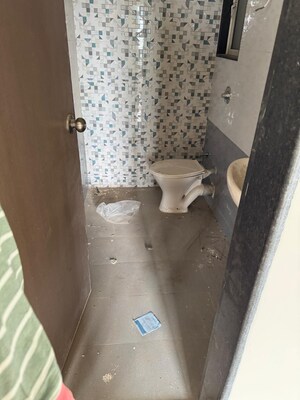 Bathroom in 1 BHK Apartment at Mahavir Kalpavruksha, Ghodbunder Road – for Sale