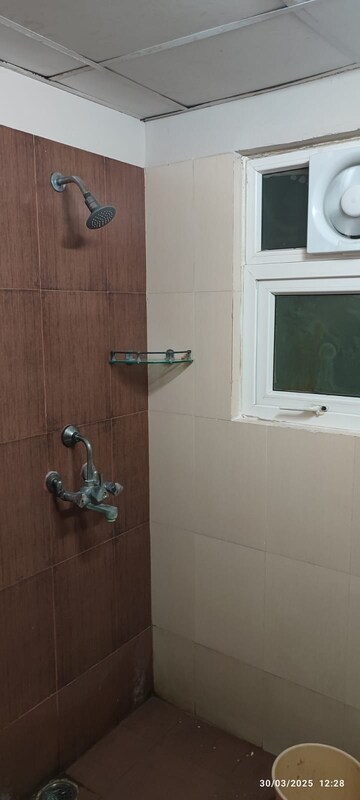Bathroom in 3 BHK Apartment at Antriksh Golf View, Sector 78 – for Rent