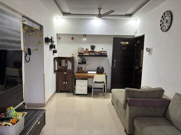 Living Room in 1 BHK Apartment at K Raheja Heights, Malad East – for Rent