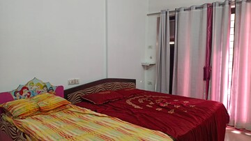 Bedroom in 2 BHK Apartment at K Raheja Heights, Malad East – for Rent
