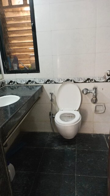 Bathroom in 2 BHK Apartment at K Raheja Heights, Malad East – for Rent