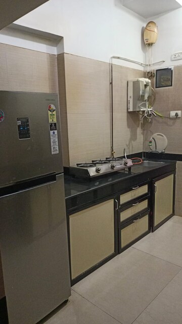 Kitchen in 2 BHK Apartment at K Raheja Heights, Malad East – for Rent