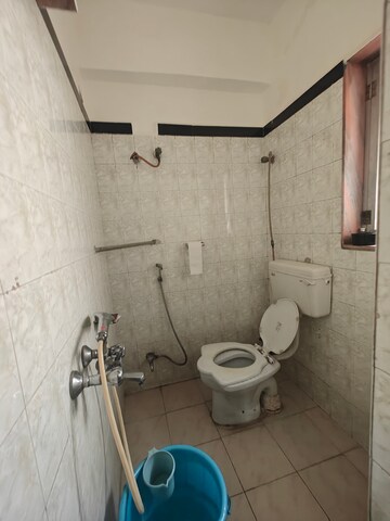 Bathroom in 2 BHK Apartment at Kendriya Vihar Seawoods, Seawoods West – for Rent
