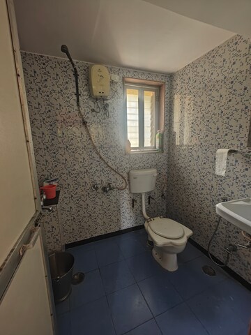Bathroom in 2 BHK Apartment at Kendriya Vihar Seawoods, Seawoods West – for Rent