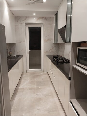 Kitchen in 4 BHK Builder Floor at Unitech Deerwood Chase, Nirvana Country – for Rent