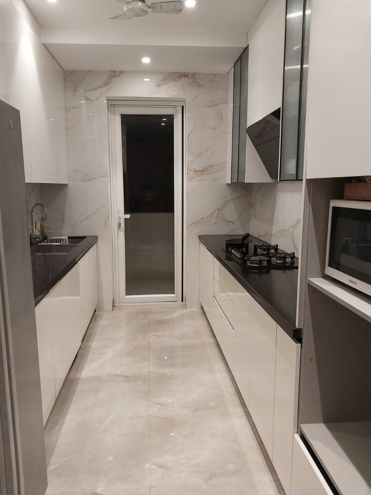 Kitchen, unitech-deerwood-chase 4 Bedroom 2450 Sq.Ft. Builder Floor In Nirvana Country Gurgaon 8938255