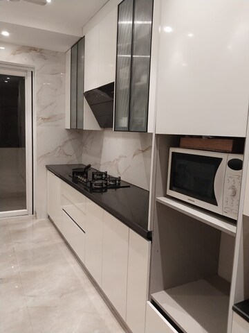Kitchen in 4 BHK Builder Floor at Unitech Deerwood Chase, Nirvana Country – for Rent