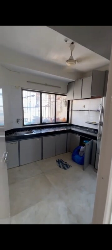 Kitchen in 1 BHK Apartment at Rameshwar Darshan CHS, Andheri West – for Rent