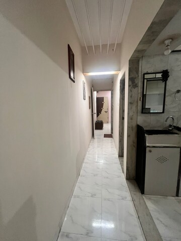 Building Lobby in 1.5 BHK Apartment at Juhu – for Rent