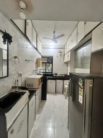 Kitchen in 1.5 BHK Apartment at Juhu – for Rent