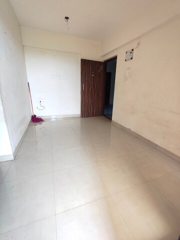 Living Room in 1 BHK Apartment at Om Sai Jai Guruji Tower, Kalyan West – for Rent