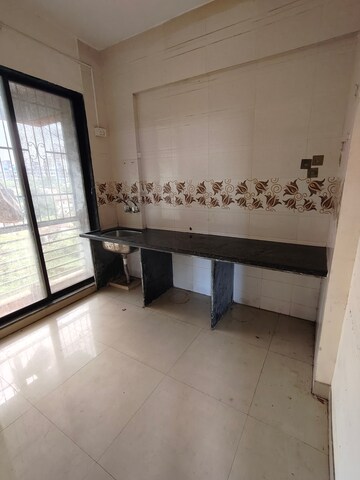 Kitchen in 1 BHK Apartment at Om Sai Jai Guruji Tower, Kalyan West – for Rent