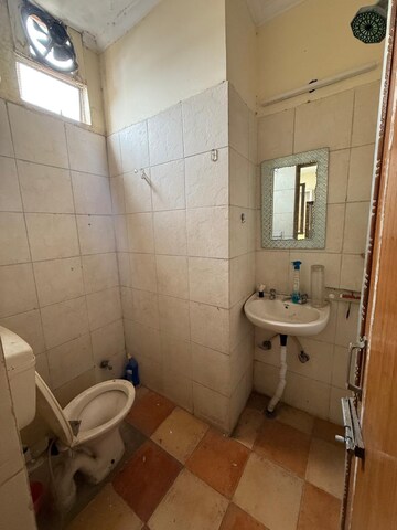 Bathroom in 2 BHK Builder Floor at Kalkaji – for Rent