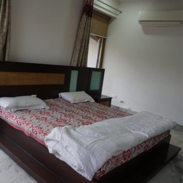 Bedroom in 4 BHK Apartment at Vasant Kunj – for Rent