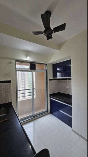 Kitchen in 1 BHK Apartment at DSS Mahavir Kalpavruksha Alcacia Tower, Ghodbunder Road – for Rent
