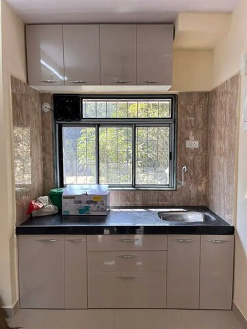 Kitchen in 2 BHK Apartment at Samruddhi CHS Goregaon West, Motilal Nagar – for Rent