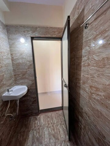 Bathroom in 2 BHK Apartment at Samruddhi CHS Goregaon West, Motilal Nagar – for Rent