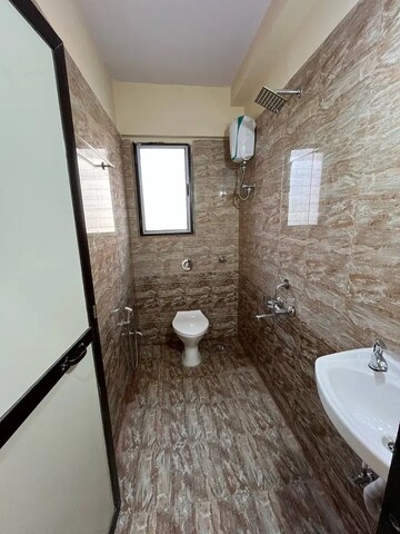 Bathroom in 2 BHK Apartment at Samruddhi CHS Goregaon West, Motilal Nagar – for Rent