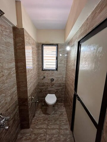 Bathroom in 2 BHK Apartment at Samruddhi CHS Goregaon West, Motilal Nagar – for Rent