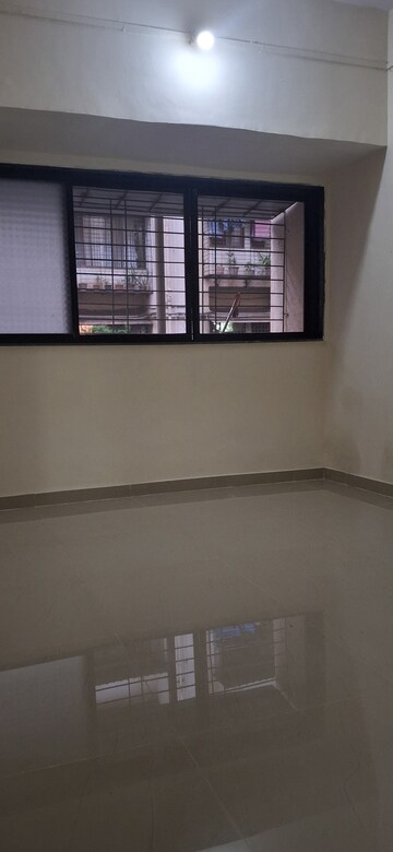 Living Room in 1 BHK Apartment at Kopar Khairane – for Rent