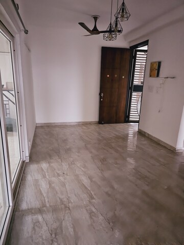 Living Room in 2 BHK Apartment at Town Park White Orchid, Sector 16c Greater Noida – for Rent