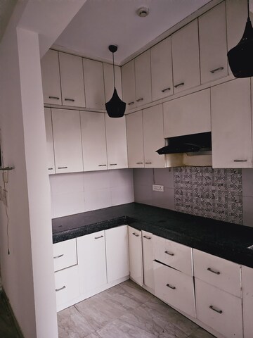Kitchen in 2 BHK Apartment at Town Park White Orchid, Sector 16c Greater Noida – for Rent