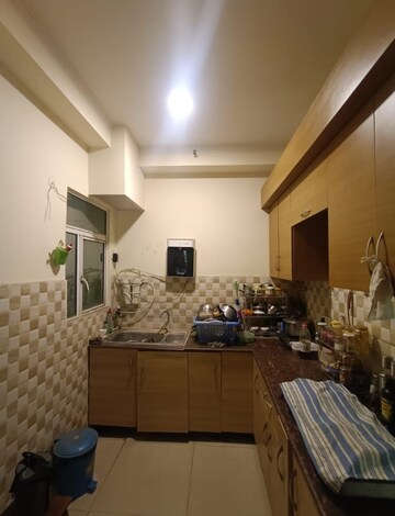 Kitchen in 2 BHK Apartment at Gaur City 6th Avenue, Sector 4 Greater Noida – for Rent