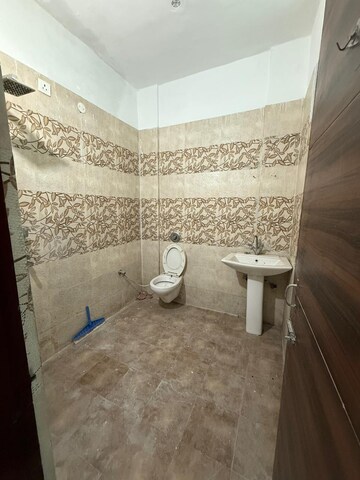 Bathroom in 3 BHK Apartment at Dhakoli – for Sale