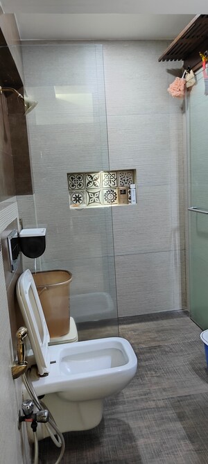 Bathroom in 2 BHK Apartment at Oshiwara Mhada, Andheri West – for Sale