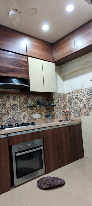 Kitchen in 2 BHK Apartment at Oshiwara Mhada, Andheri West – for Sale