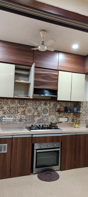 Kitchen in 2 BHK Apartment at Oshiwara Mhada, Andheri West – for Sale
