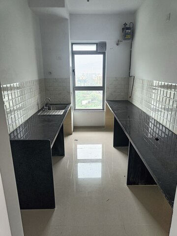 Kitchen in 2 BHK Apartment at Kalpataru Immensa, Kolshet Road – for Rent