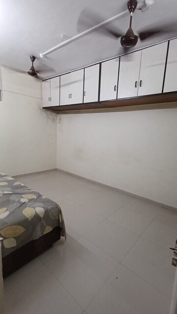 Master Bedroom in 2 BHK Apartment at Doodhwala Society, Goregaon East – for Rent
