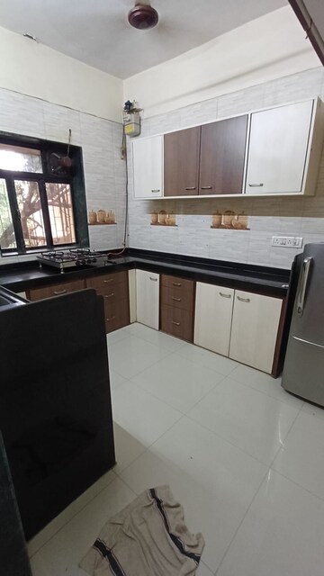 Kitchen in 2 BHK Apartment at Doodhwala Society, Goregaon East – for Rent