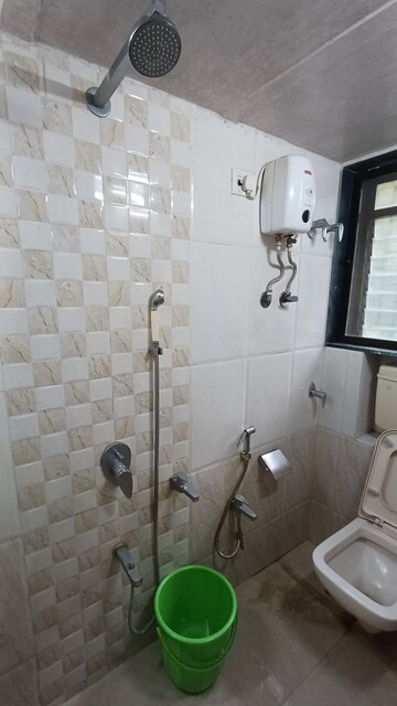 Bathroom in 2 BHK Apartment at Doodhwala Society, Goregaon East – for Rent