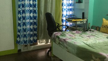 Living Room in 2 BHK Apartment at Paramount Symphony, Sain Vihar – for Rent