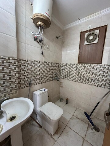 Bathroom in 3 BHK Apartment at Freedom Fighters Enclave – for Rent