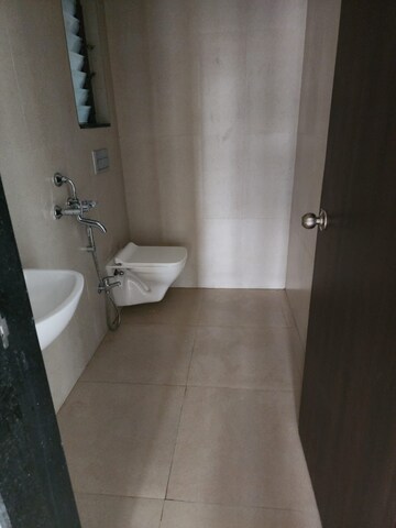 Bathroom in 2 BHK Apartment at Runwal Gardens Phase I, Dombivli East – for Rent