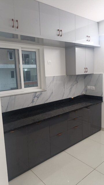 Kitchen in 2 BHK Apartment at Aparna Sarovar Zicon, Nallagandla – for Rent
