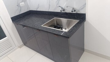 Kitchen in 2 BHK Apartment at Aparna Sarovar Zicon, Nallagandla – for Rent