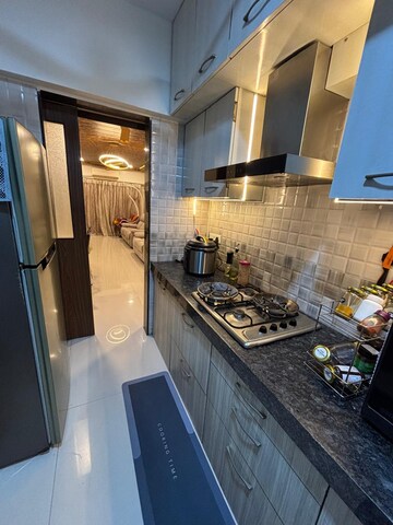 Kitchen in 2 BHK Apartment at Spark Mogra Vikas Chs, Andheri East – for Rent