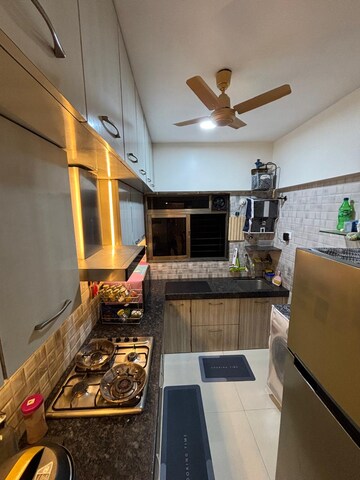 Kitchen in 2 BHK Apartment at Spark Mogra Vikas Chs, Andheri East – for Rent