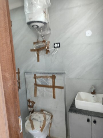 Bathroom in 3 BHK Builder Floor at Freedom Fighters Enclave – for Rent