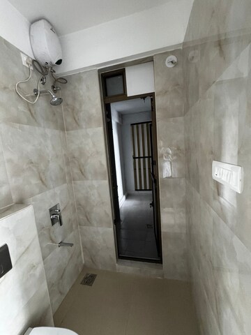 Bathroom in 2 BHK Apartment at Raymond Ten X Habitat, Pokhran Road No Two – for Rent