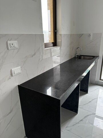 Kitchen in 2 BHK Apartment at Raymond Ten X Habitat, Pokhran Road No Two – for Rent